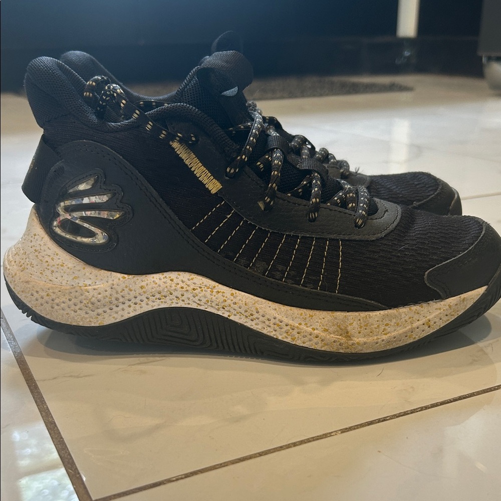 Under Armour Black and Gold Steph Curry Athletic Shoes